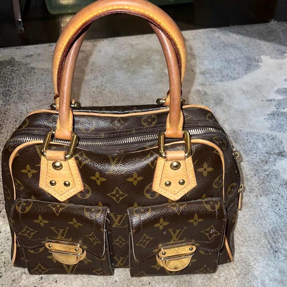 Louis Vuitton
Louis Vuitton Monogram Canvas Manhattan PM Bag